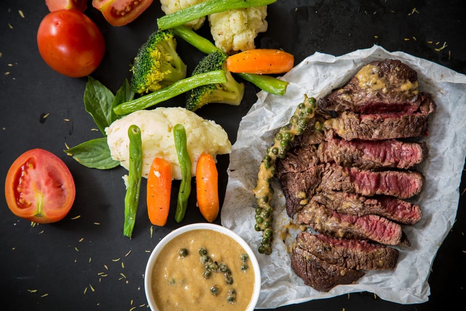 Marbled beef over open flame