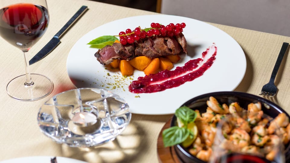 Duck slow-cooked over cherry-wood fire